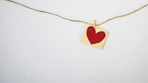heart drawing hanging from a string