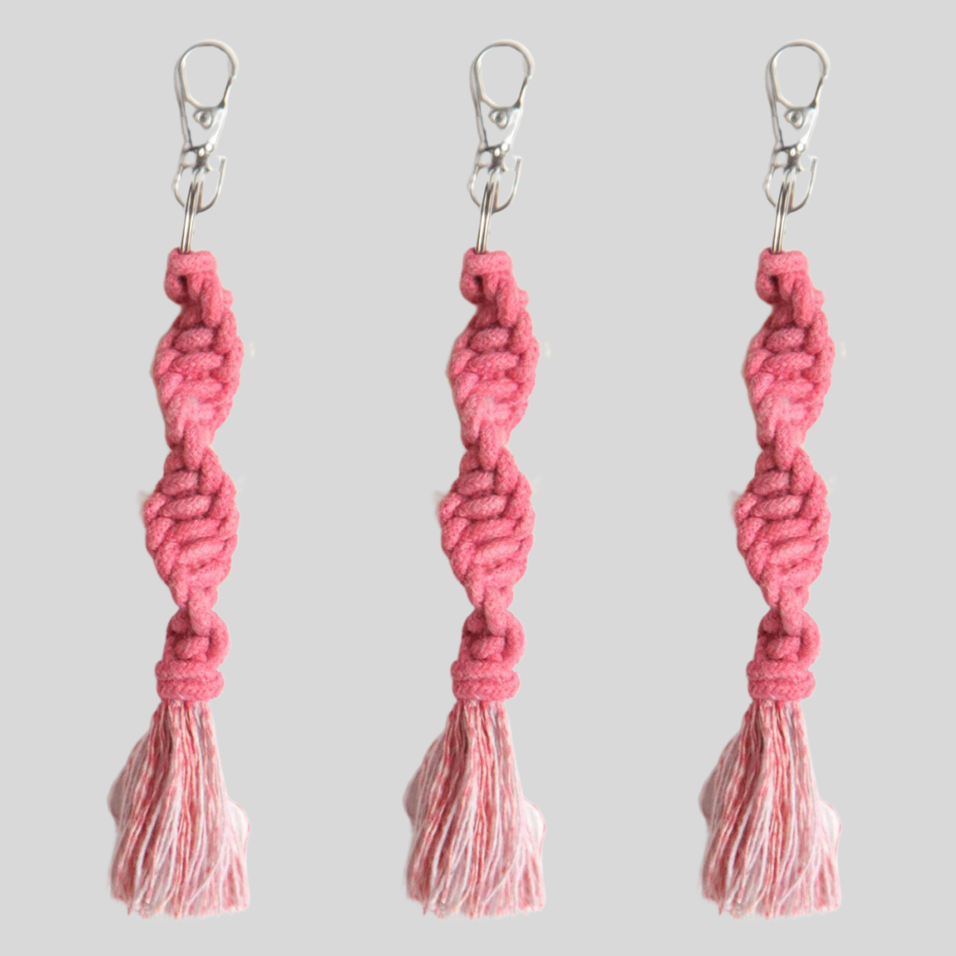 three macrame keychains